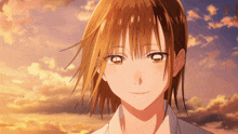 a close up of a girl with a sunset in the background