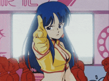 a girl with blue hair is pointing her finger at the camera in front of a sign that says " in "