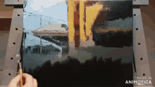 a painting is being painted on a canvas with the words made in animotica below it
