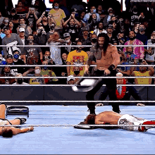 Roman Reigns Con Chair To GIF