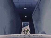 a man in a green jacket crawls through a dark hallway