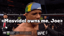 a man wearing a headband is talking into a microphone with the words masvidal owns me joe above him