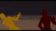 a yellow and red figure are standing next to each other in a blurry picture