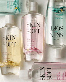 several bottles of avon skin so soft bath oil