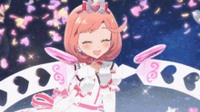 a girl in a white dress with pink wings and a crown is smiling
