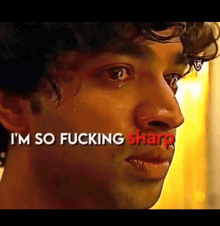 a man is crying with the words i 'm so fucking sharp above him
