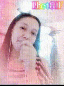 a blurry picture of a girl with the word bhetgif written on the bottom