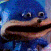 a close up of a sonic the hedgehog doll with a big mouth .