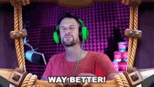 a man wearing green headphones is standing in front of a microphone and says way better !