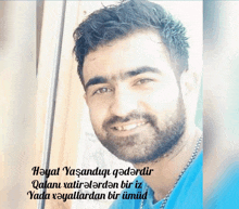 a man with a beard is smiling with the words hayat yasandugu qederdir