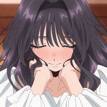 a close up of a girl with purple hair covering her mouth with her hands