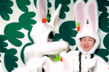 a person wearing a bunny costume with a carrot on their head