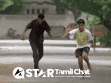 a man and a boy are running down a street with a star tamil chat logo in the background