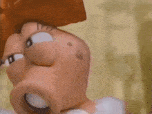 a cartoon character is blowing a bubble with his mouth