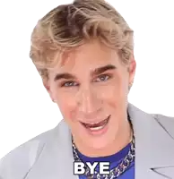 a man wearing a blue shirt and a chain around his neck says bye
