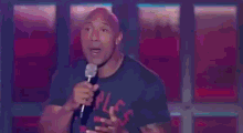 a woman is dancing on a stage in front of a crowd with a sign that says up sync battle
