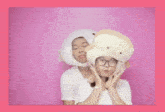a man and a woman are posing for a picture while wearing stuffed animal hats