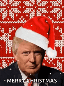 donald trump is wearing a santa hat on a christmas sweater .