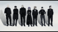 a group of people are standing in a row with their arms crossed