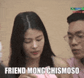 a man and a woman are sitting next to each other and the woman says friend mong chismo so