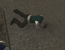 a man is laying on the ground with his legs crossed