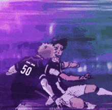 two soccer players one with the number 50 on his back