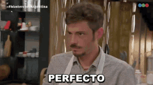 a man with a mustache is making a funny face and the word perfecto is above him