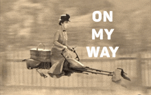 a woman is riding a flying vehicle with the words on my way written above her