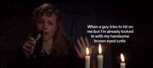 a woman holding a bottle in front of candles with a caption that says when a guy tries to hit on me but