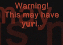 a sign that says warning this may have yuri on it