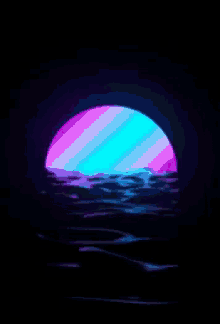 a colorful sunset over a body of water with waves
