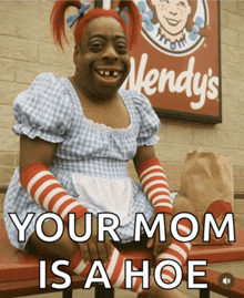 a wendy 's sign is behind a cartoon character