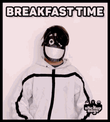 a person with a mask on holding a box of cereal with the words breakfast time written above them