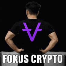 a man wearing a black t-shirt with a purple cross on it and the words fokus crypto below him