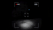 a recording of a person 's face is being recorded on a black background .