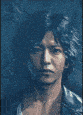 a close up of a man 's face with a black background