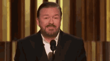 Shut Up Stop Laughing GIF - Shut Up Stop Laughing Ricky Gervais GIFs