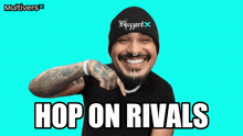 a man wearing a beanie and a black shirt with the words hop on rivals on the bottom