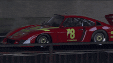 a red car that says mon on the side