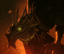 a drawing of a dragon with a glowing green eye