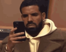 Drake Looking At Phone GIF - Drake Looking At Phone Shocked GIFs