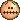a football with stitches on it 's face and mouth .