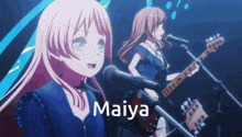a girl singing into a microphone next to a girl playing a guitar with the name maiya on the bottom