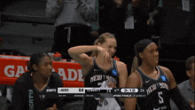 a basketball game is being played between the new york nets and the aces
