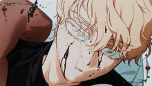 a close up of a person 's face with blood dripping from it