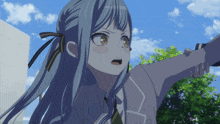 a girl with blue hair and a bow in her hair