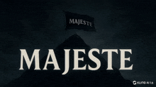 the word majeste is on a dark background