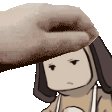a person is petting a cartoon character 's head with a hand .