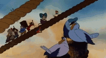 a group of cartoon characters are walking across a rope .