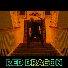 a poster for the movie red dragon shows a man holding a knife